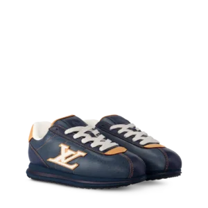 This edition of the LV BUTTERSOFT sneaker comes in denim-look lambskin and calfskin leather. Designed by Pharrell Williams, Creative Director of the Men's collection, this model takes its name from the exceptional suppleness of its leather, complemented by a quilted upper expertly stitched by Louis Vuitton artisans. A nod to the Fall/Winter 2025 Men's show, natural leather finishes inspired by leather goods, as well as LV Initials and embossed motifs illustrating Pharrell Williams' profile and a lobster, complete this iconic shoe. Navy blue Lambskin / Denim-effect calfskin Laces Iconic details Hand stitching on the upper EVA outsole with signature details Made in Italy